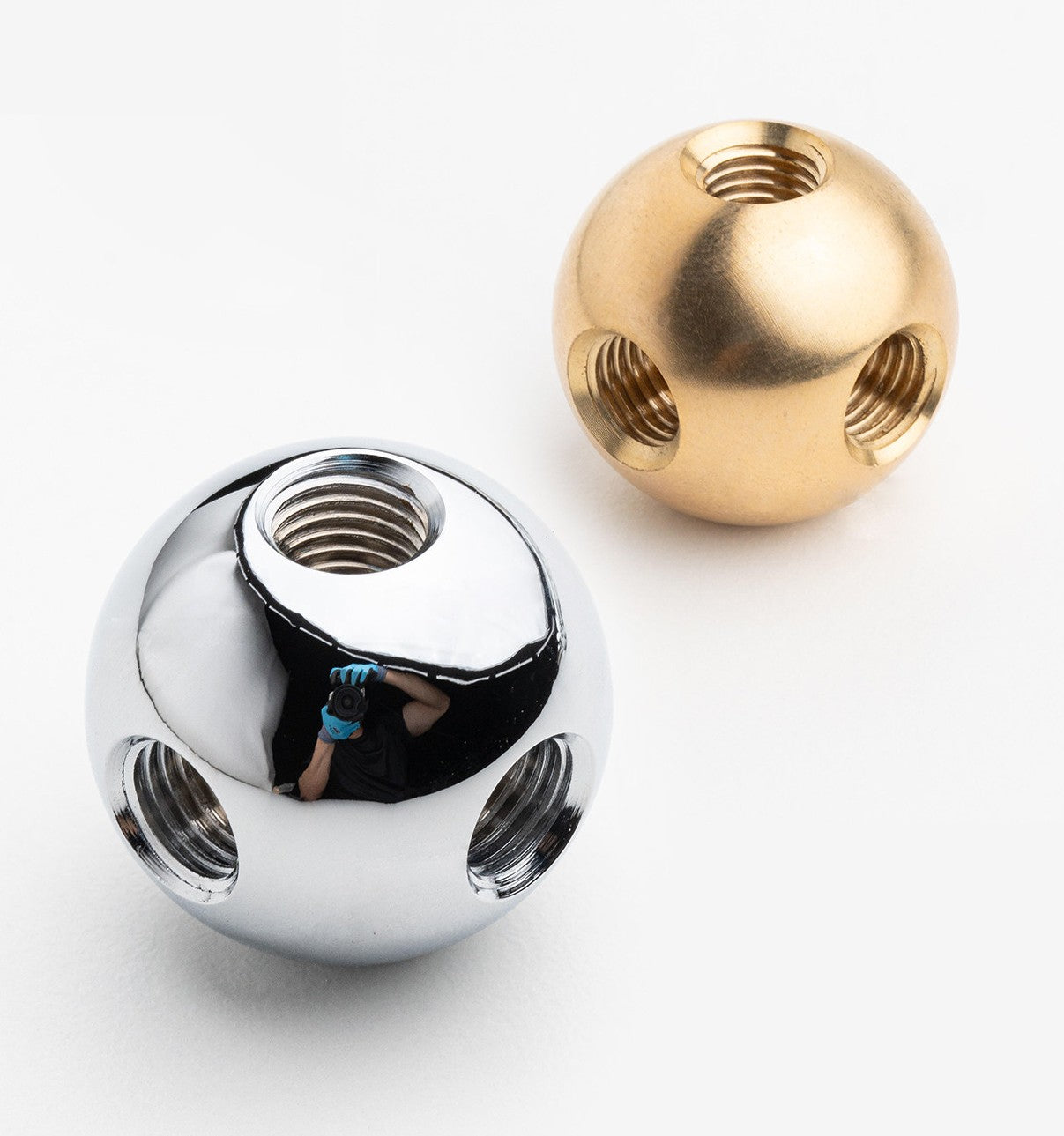 Brass spherical connectors for modular steel furniture